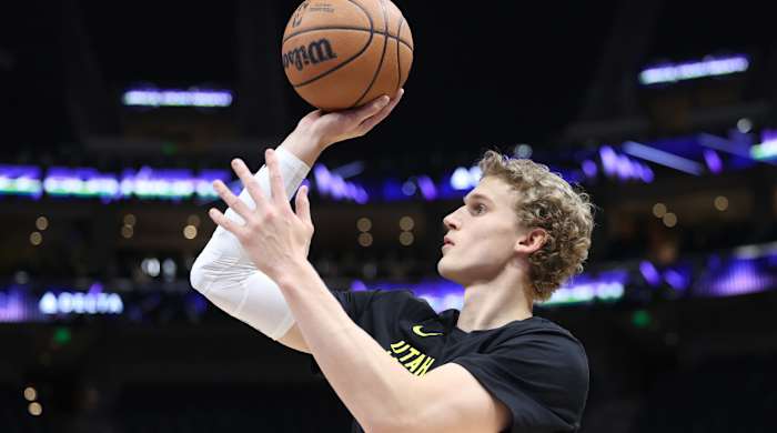 Jazz forward Lauri Markkanen warms up before a game.